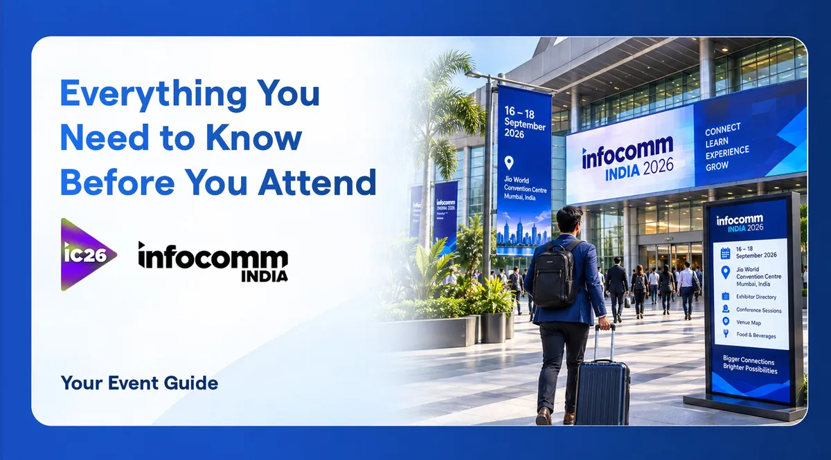 La entrada del Jio World Convention Centre con banners de InfoComm India 2026 que muestran las fechas del 16 al 18 de septiembre y una pantalla con el directorio de expositores, las sesiones de conferencias y el mapa del recinto