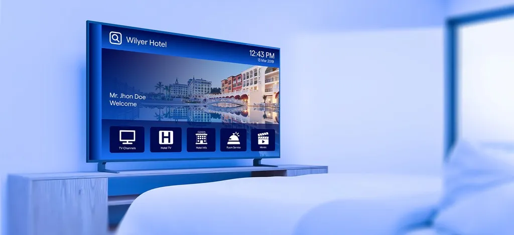 In-room TV showing hotel info and on-demand guest services